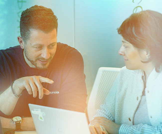 argenx colleagues working together over a laptop