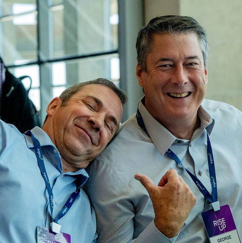 Two argenx employees at an employee event