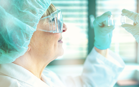a scientist conducting treatment formulation research in a laboratory